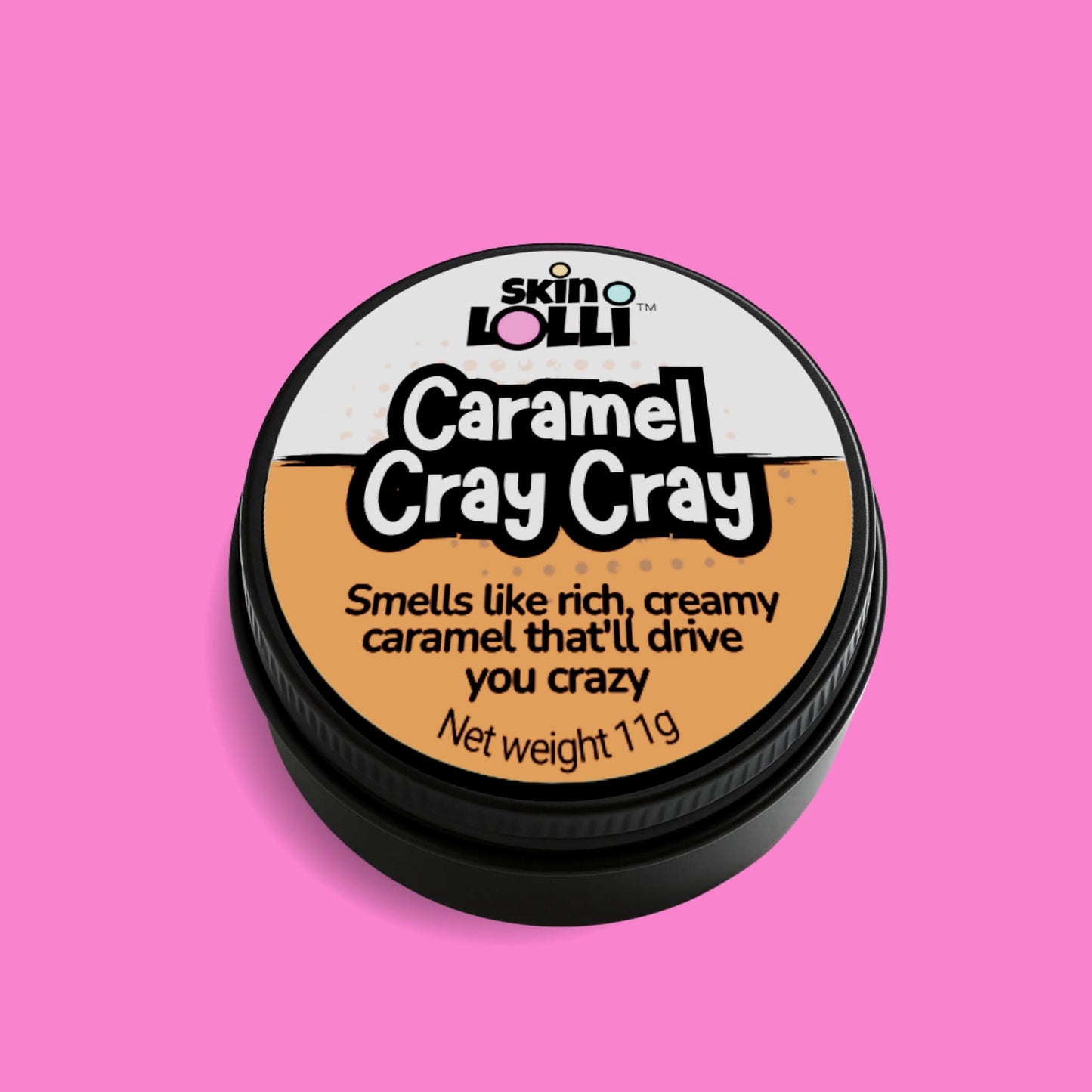tin of Caramel Cray Cray by Skin lolli, a caramel scented solid perfume, against a pink background