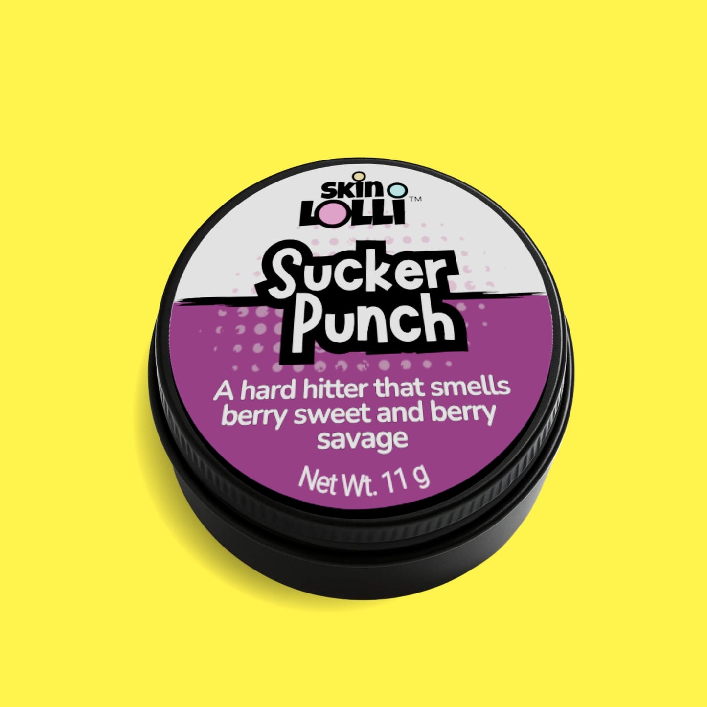 Tin of 'Sucker Punch' by skin LOLLI on a yellow background. Berry scented perfume