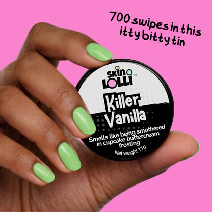 Hand holding a container of 'Killer Vanilla' by Skin LOLLI against a pink background