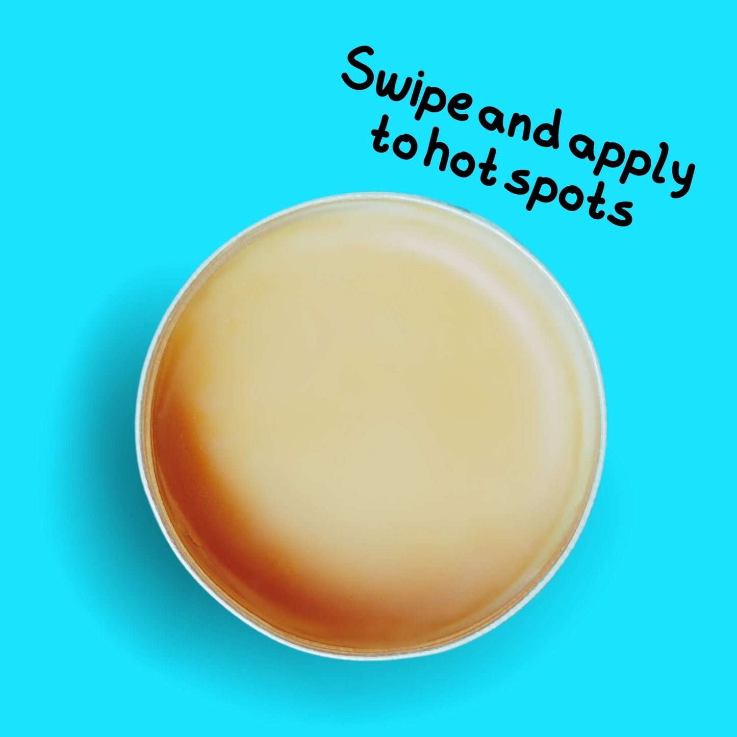 open tin of Skin Lolli 'Battered & Boozed' cookie dough swipe on scent on a aqua background with text, swipe and apply to hot spots