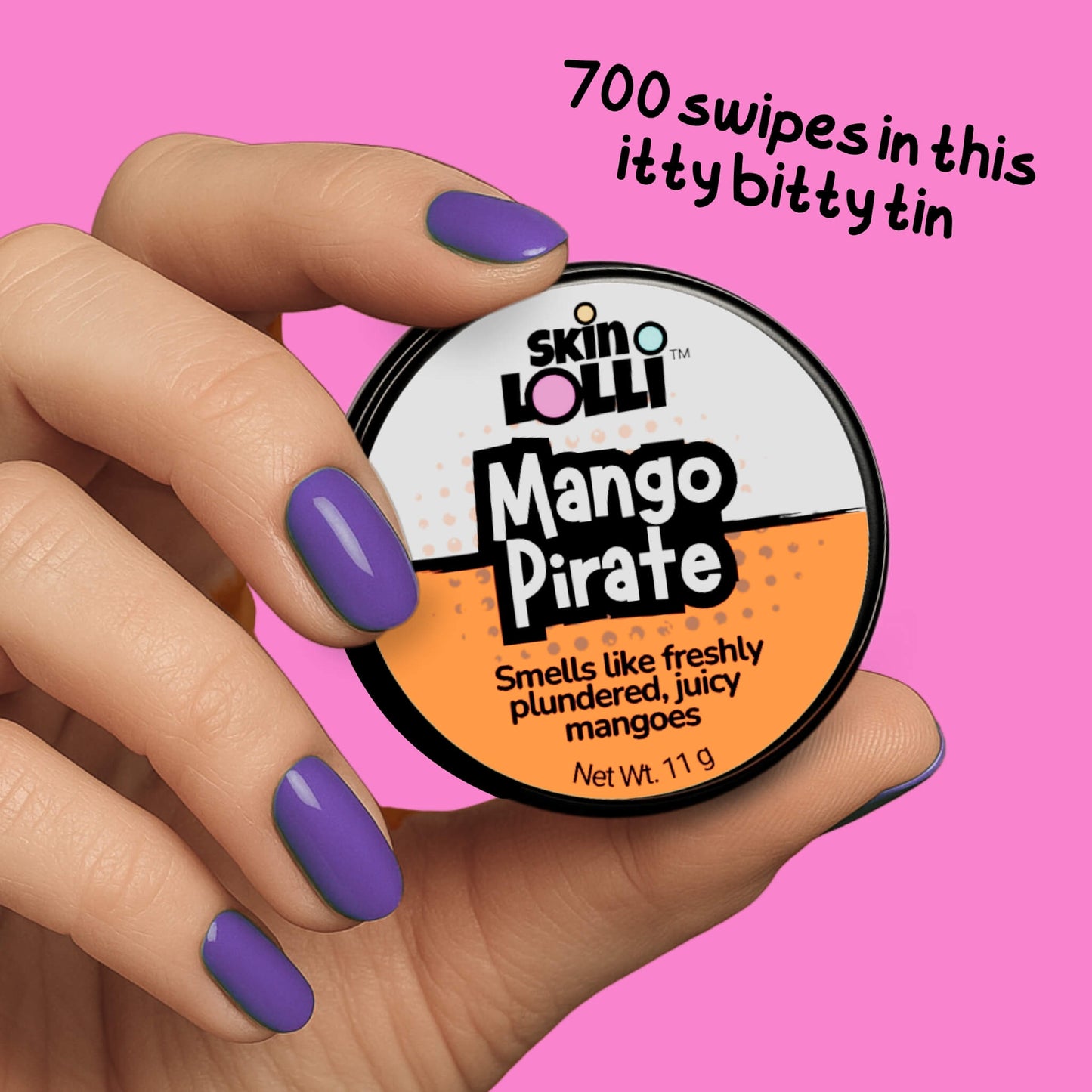 Hand holding a tin of 'Mango Pirate' solid scent by skin LOLLI with text on a pink background that reads, 700 swipes in this itty bitty tin
