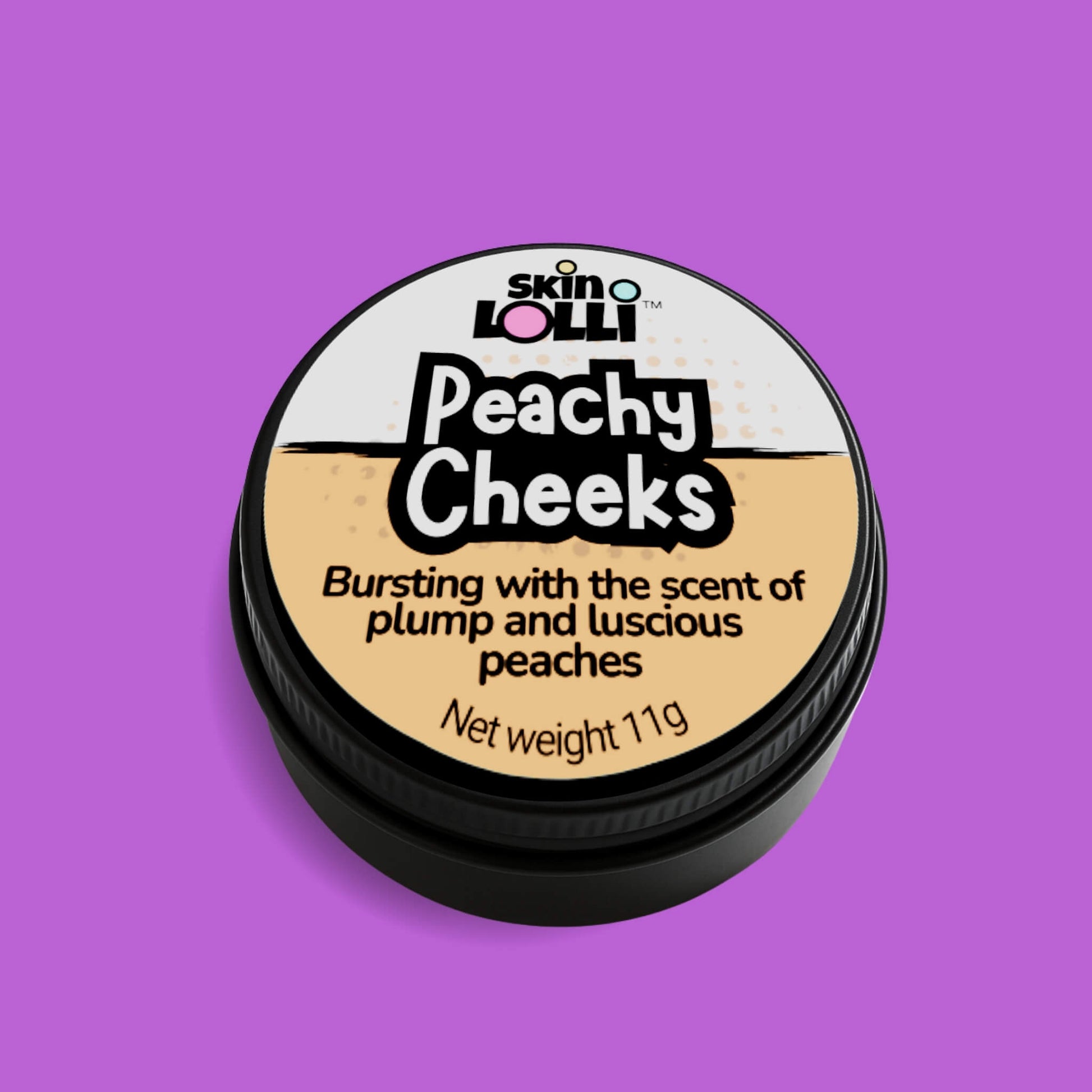 Tin of 'Peachy Cheeks' swipe on scent by skin LOLLI on a purple background