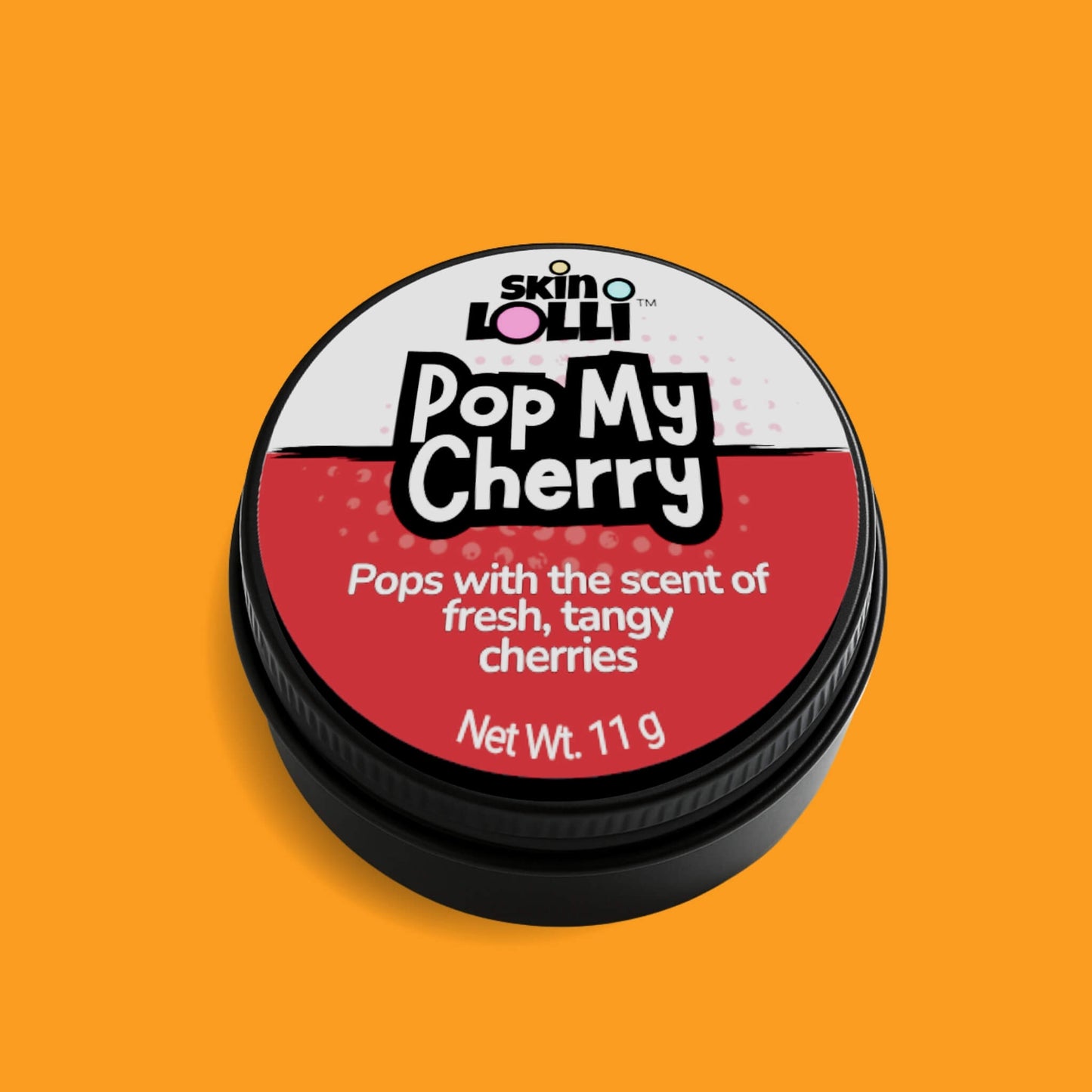 Tin of 'Pop My Cherry' solid perfume by skin LOLLI on an orange background