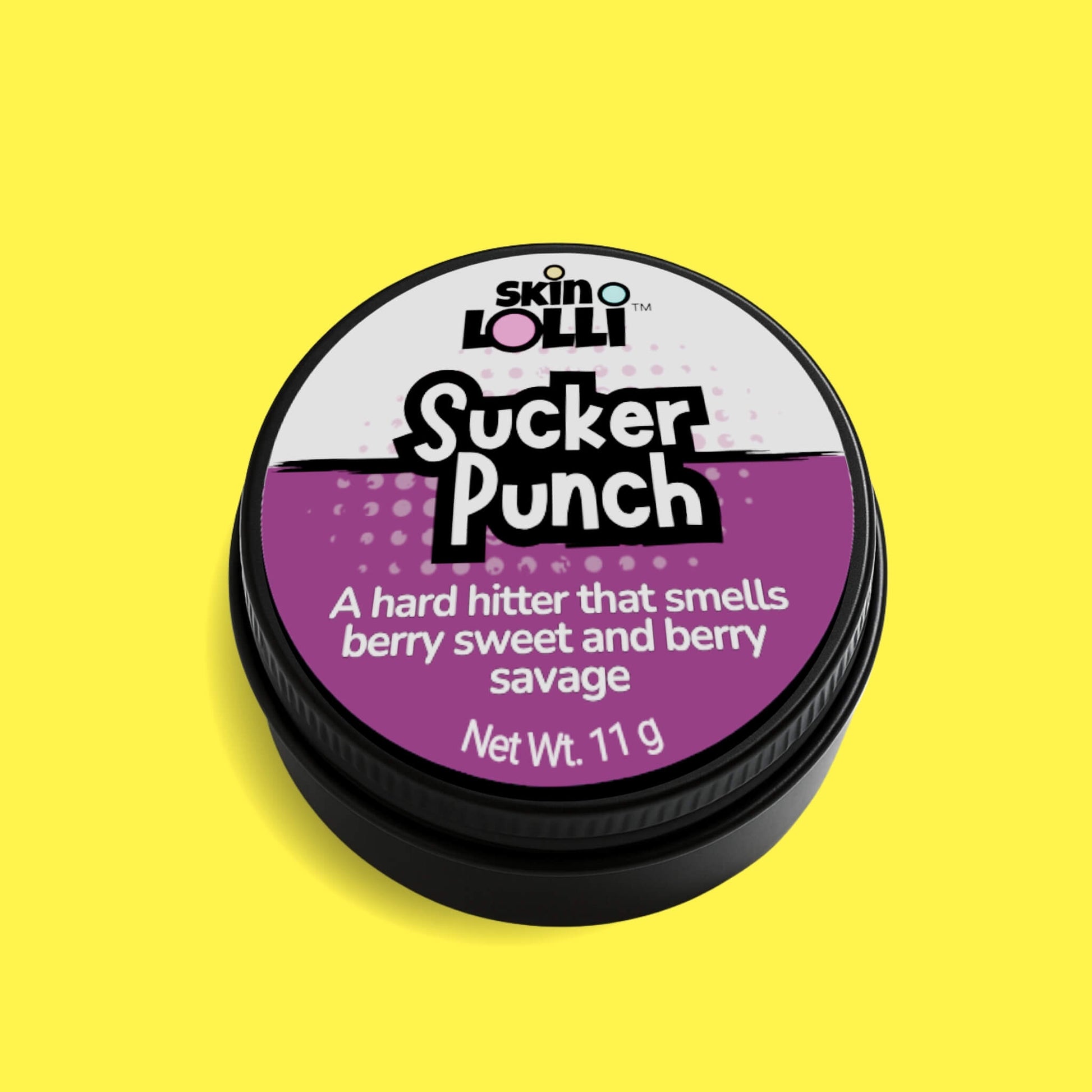 Tin of 'Sucker Punch' by skin LOLLI on a yellow background. Berry scented perfume