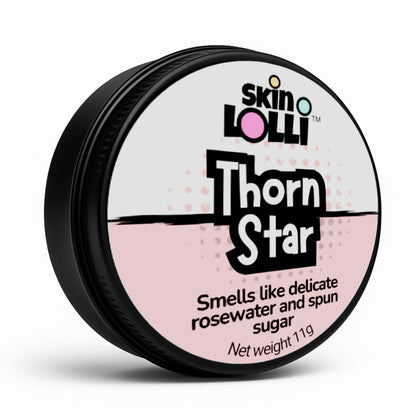 Tin of skin lolli Thorn Star rosewater solid perfume on white background